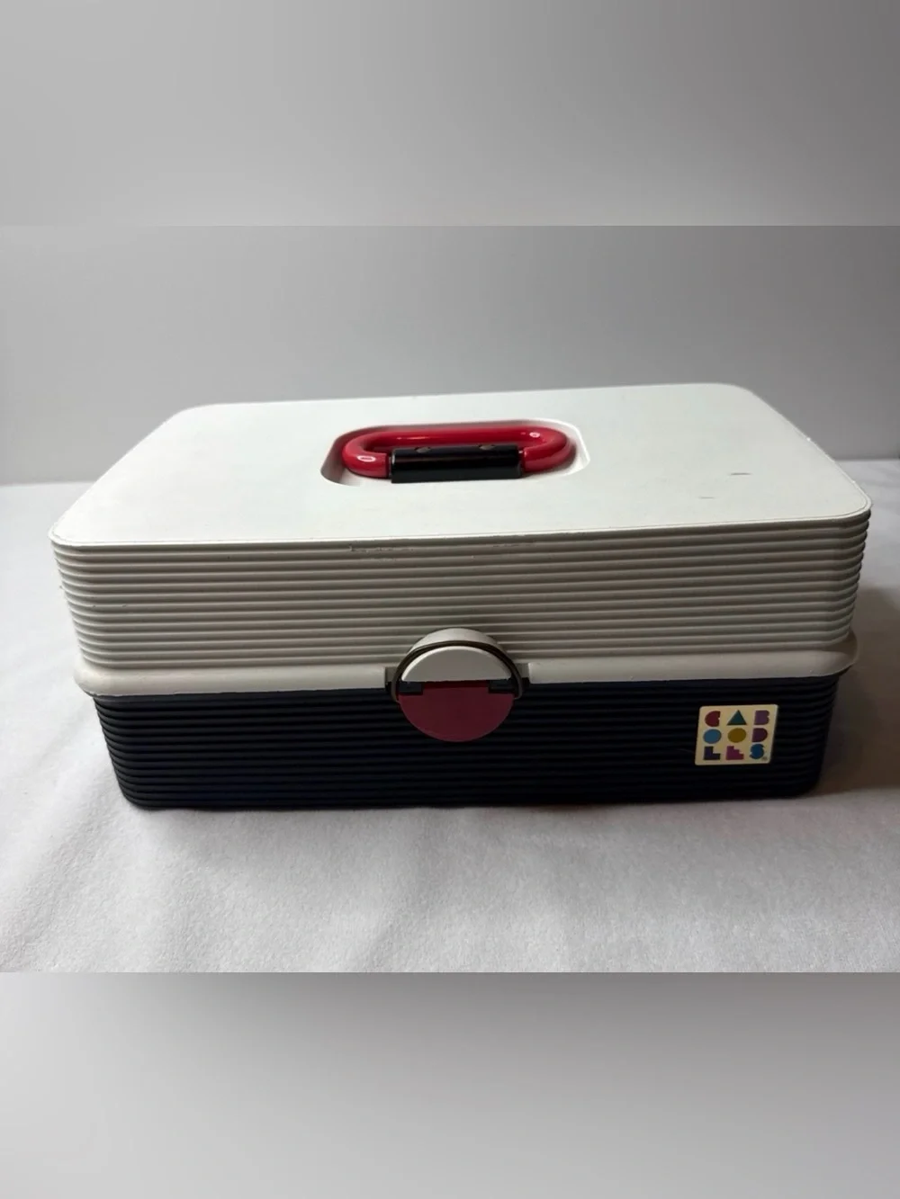 Retro Plastic Storage Case with Red Accent